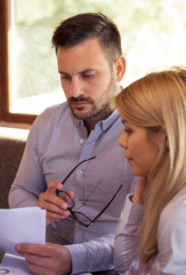 couple-studing-documents support